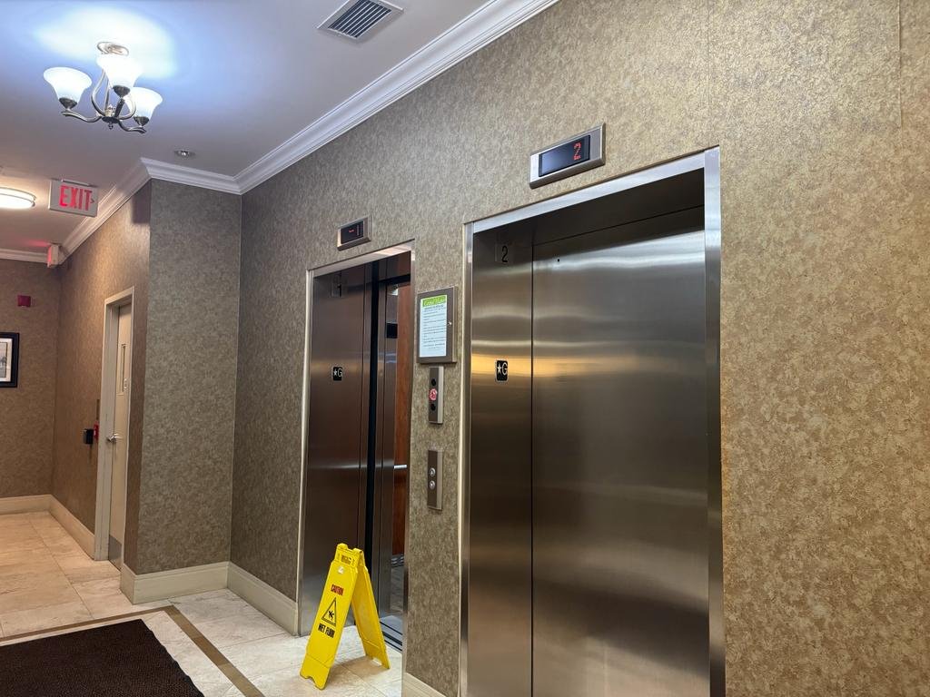 Grand Manor Condos Lobby before - Folio Interiors